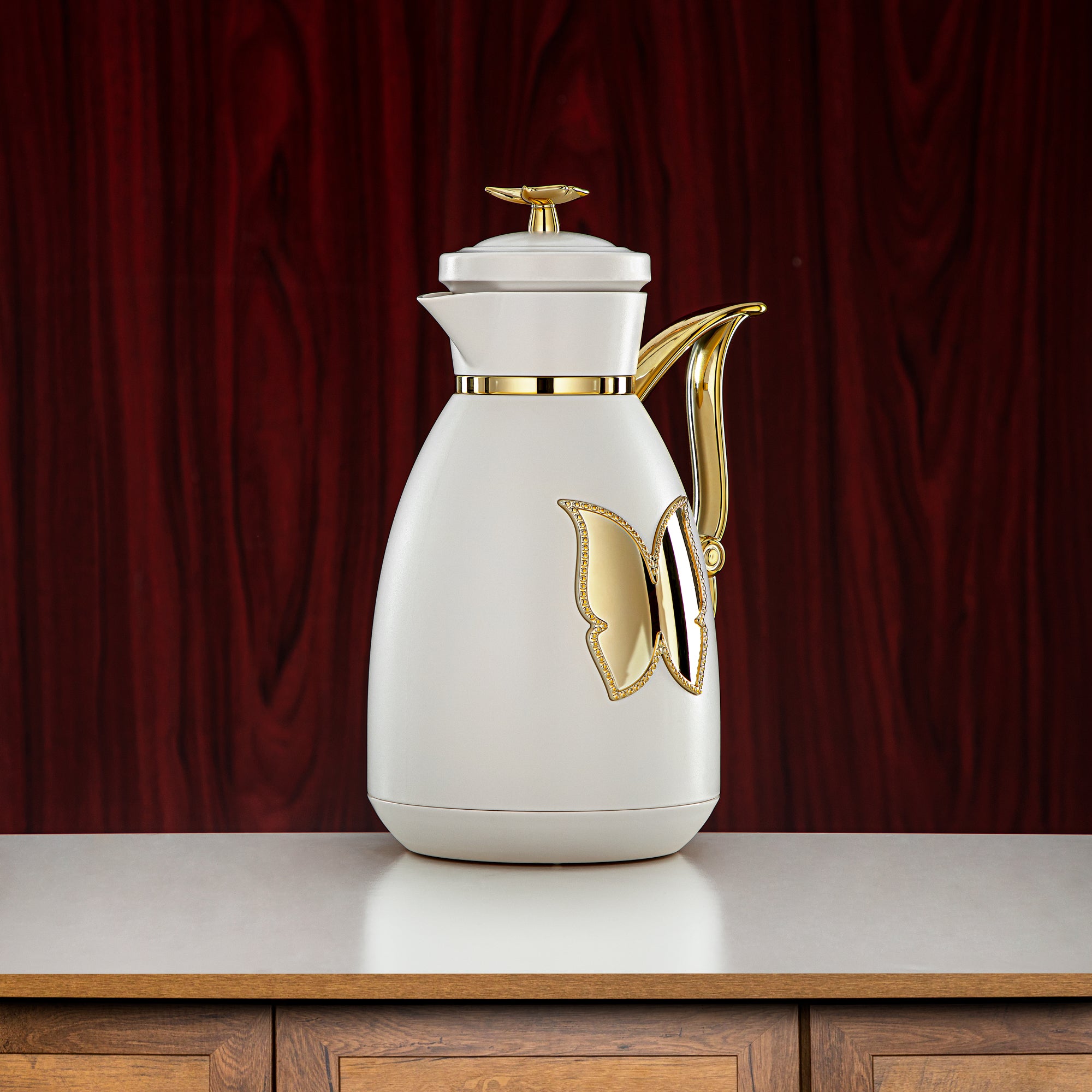 طقم ترامس المرجان بلاستيك زر ضغط 0.7 لتر + 1 لتر عاجي وذهبي (SM-2C142-070/100 IV/G) - زجاجة شاي وقهوة